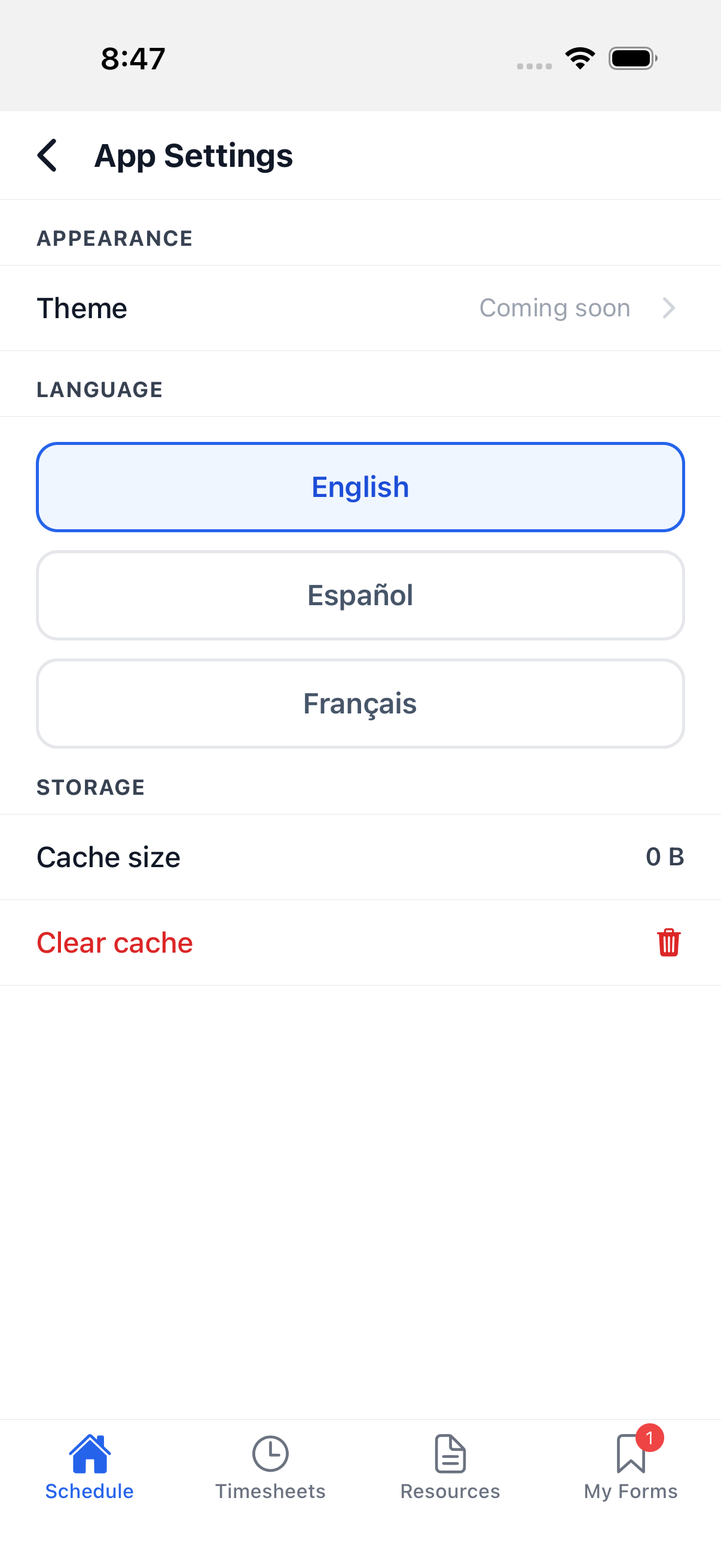 App Settings screen showing Theme (Coming soon), a Language picker, and Storage with Cache size and Clear cache